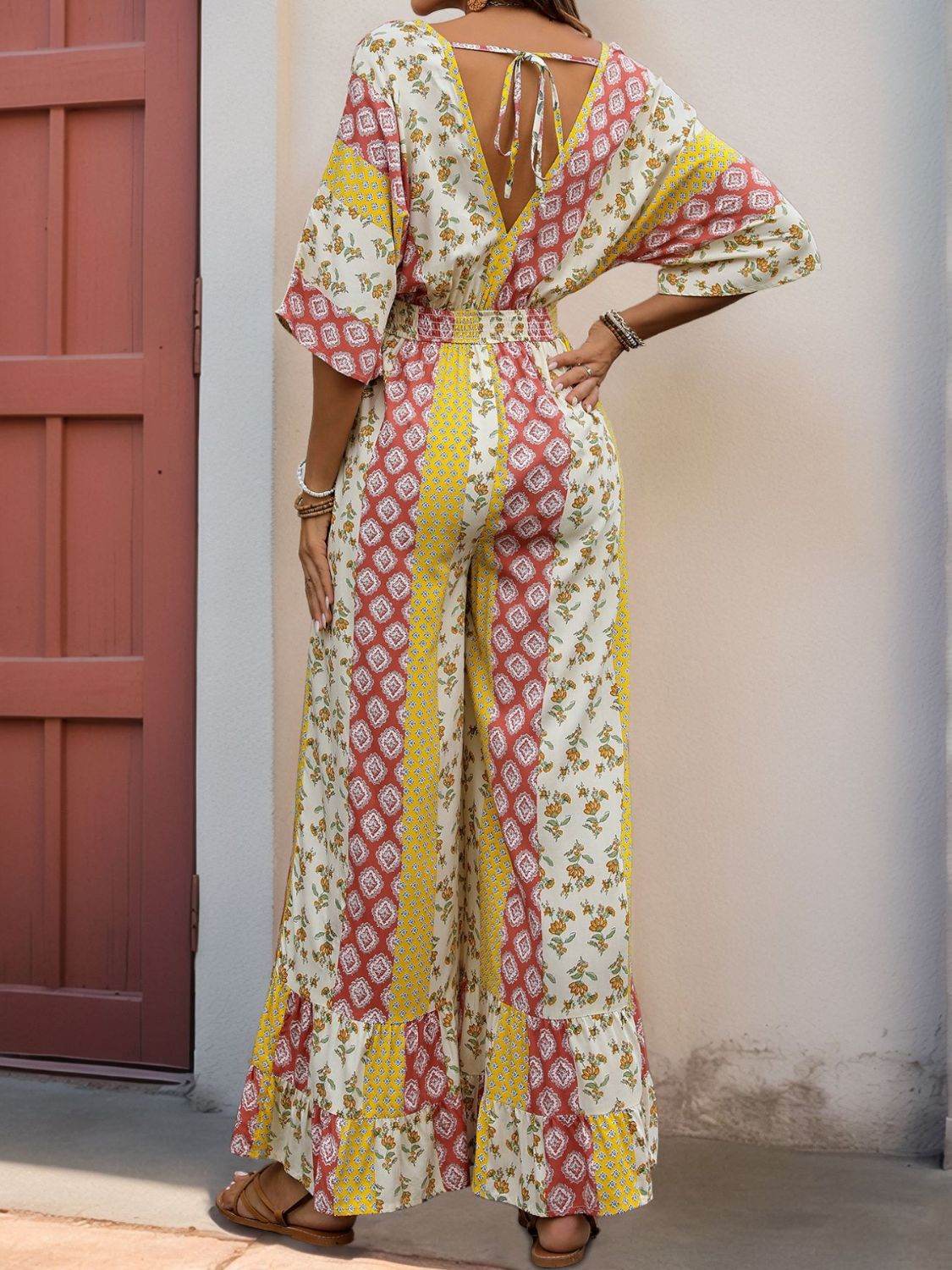 Perfee Ruffled Hem Printed V-Neck Jumpsuit - Selvanelle