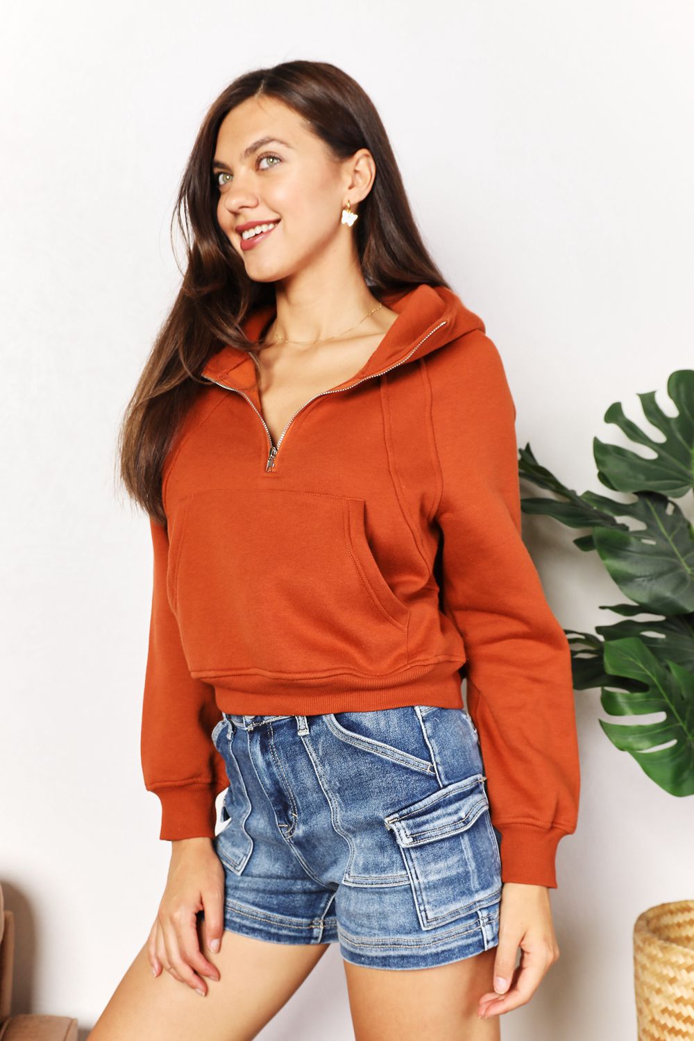 Chic Double Take Half-Zip Long Sleeve Hoodie in warm tones, perfect for casual or activewear styling.