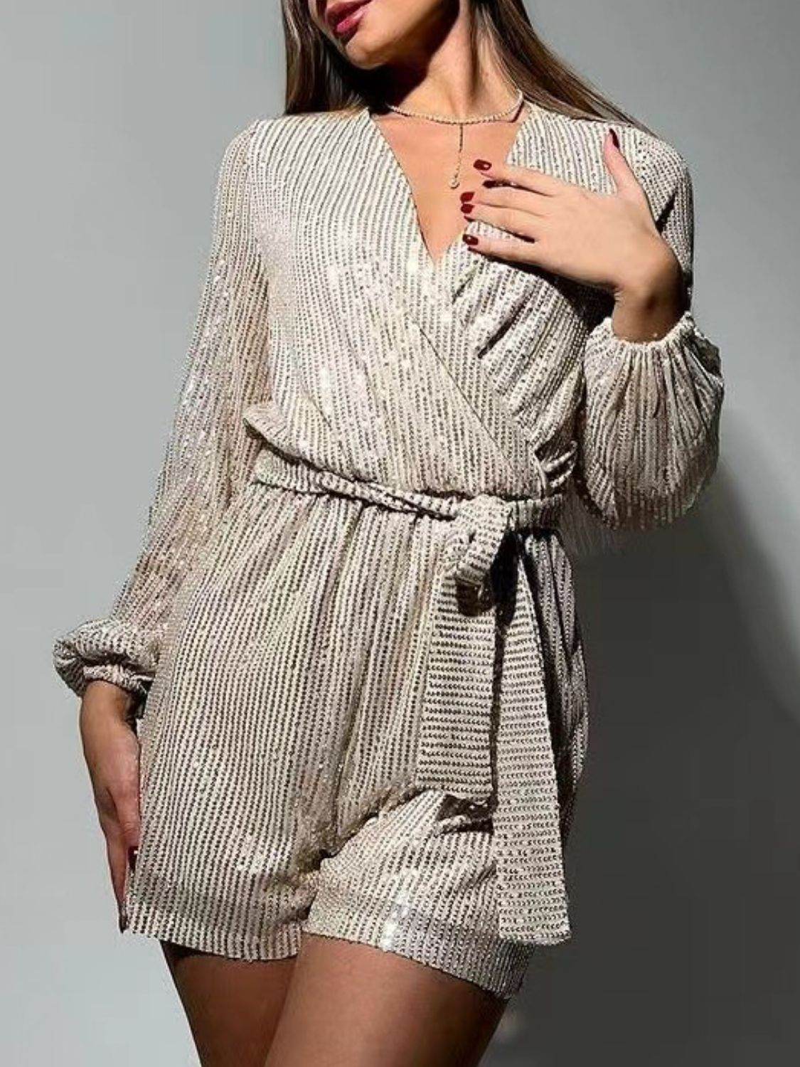 Full Size Sequin Surplice Tie Waist Long Sleeve Romper - Selvanelle