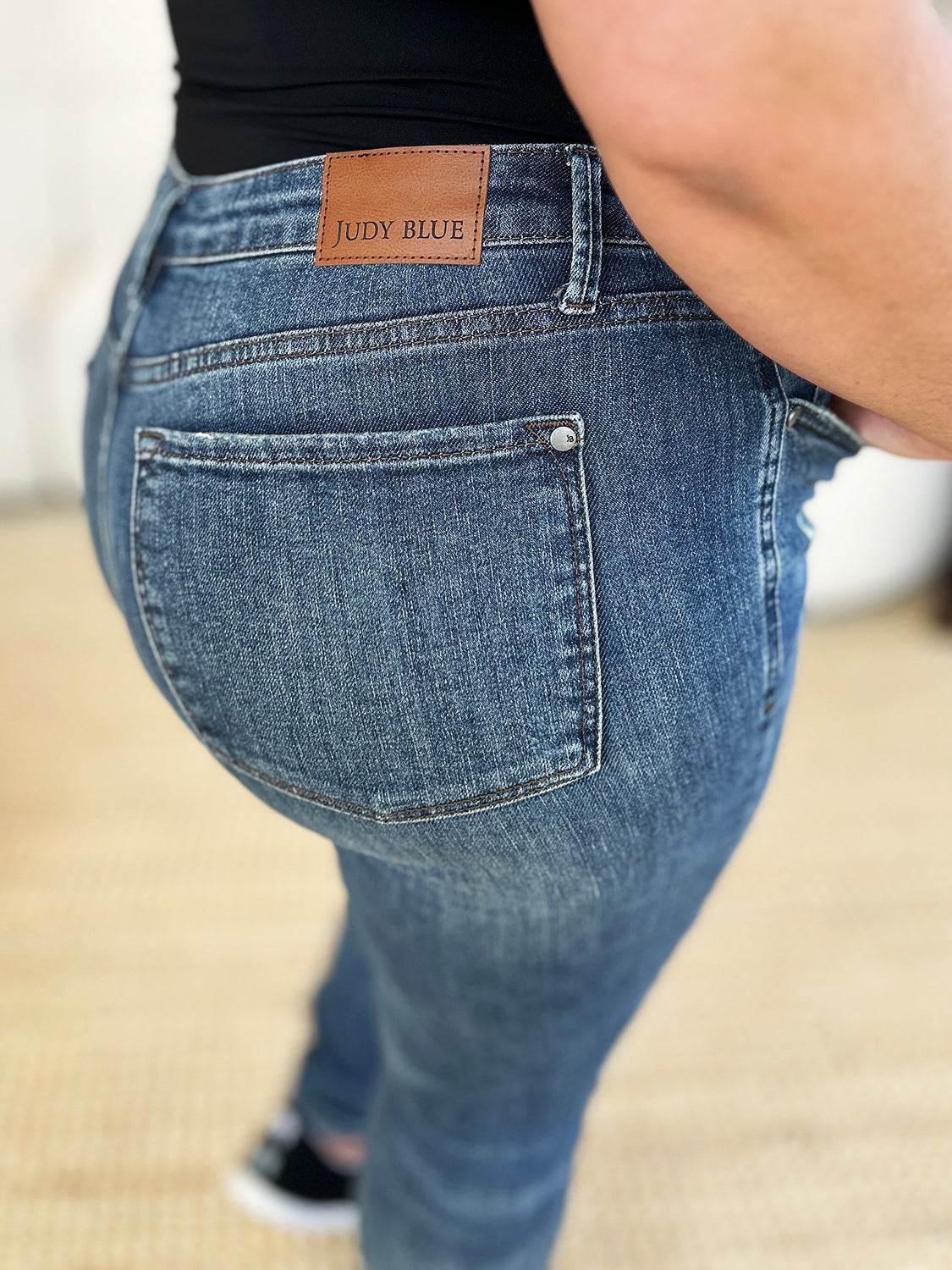 Judy Blue Full Size Mid Waist Distressed Slim Jeans For Women - Selvanelle