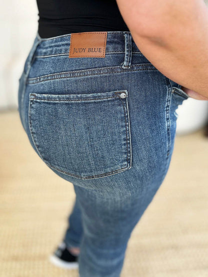 Judy Blue Full Size Mid Waist Distressed Slim Jeans For Women - Selvanelle