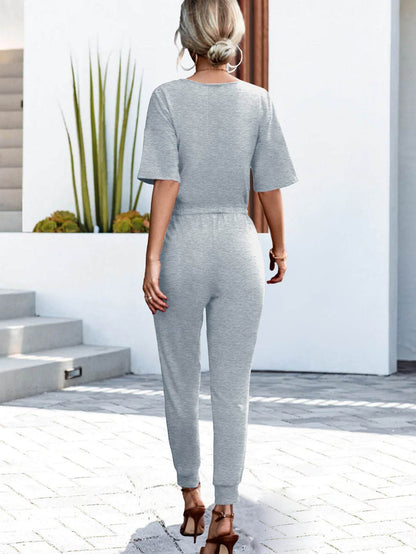 Buttoned Half Sleeve Round Neck Jumpsuit - Selvanelle